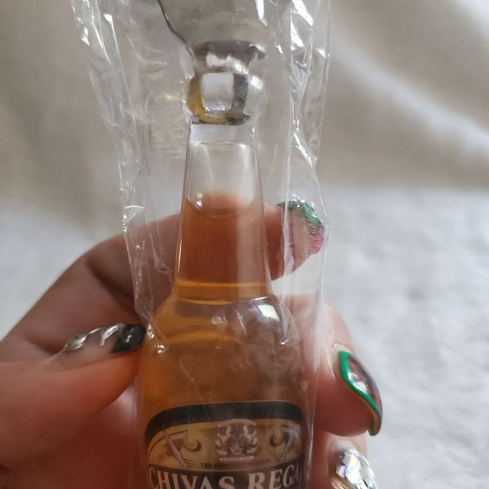 This is just a bottle opener! lol. Chivas Regal Brown Gold 5.5 inches